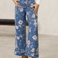 Blomstrete cropped jeans med vide ben for kvinner