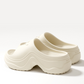 Dame minimalistiske komfortslippers med platåsåle