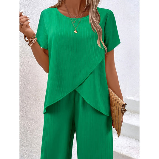 Dame casual antrekk med asymmetrisk topp og bukser med vide ben