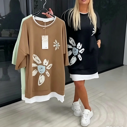 Dame-sweatkjole med blomsterprint og falskt todelt design
