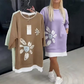 Dame-sweatkjole med blomsterprint og falskt todelt design