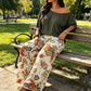 Dame Todelt Sett med Off-Shoulder Topp og Mønstrede Bukser