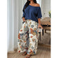 Dame Todelt Sett med Off-Shoulder Topp og Mønstrede Bukser