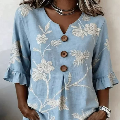 Sommerbluse med blomsterprint og volangermer for kvinner