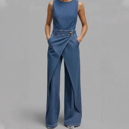 Ermeløs asymmetrisk omslags denim jumpsuit for kvinner