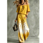Dame 2-delt sett med off-shoulder topp og gradient leopardmønster
