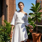 Sett med off-shoulder topp og asymmetrisk skjørt for kvinner