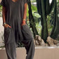 Ensfarget jumpsuit for kvinner