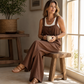 Jumpsuit for kvinner i fritidsstil med brede stropper og knapper