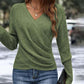 Elegant strikket topp med wrap‑over V‑hals for kvinner