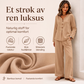 Dame sett med V-hals langermet topp og vide bukser