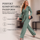 Dame langermet jumpsuit med V-hals og belte