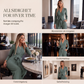 Dame langermet jumpsuit med V-hals og belte