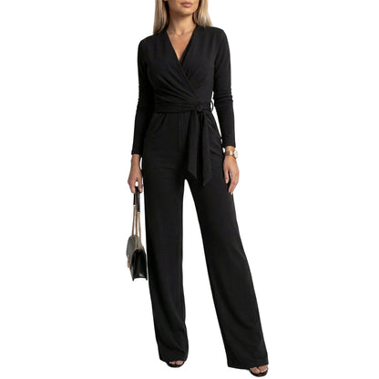 Dame langermet jumpsuit med V-hals og belte