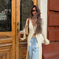Lang heklet hullete cardigan for kvinner
