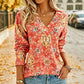 Elegant topp med blomsterprint og V-hals for kvinner