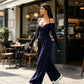 Elegant halterneck-drakt med dyp V-hals for kvinner