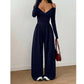 Elegant halterneck-drakt med dyp V-hals for kvinner