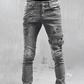 Smalpassede revne jeans for menn