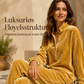 Sett med langermet bluse med knapper og vide bukser for kvinner