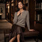 Elegant ribbestrikket topp for kvinner med metallspenne