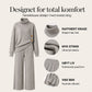 Damesett med strikket turtleneck-genseren og vidbeinte bukser