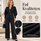 Kvinnelig elegant blazer med puff ermer og buksett med vidbeinte bukser